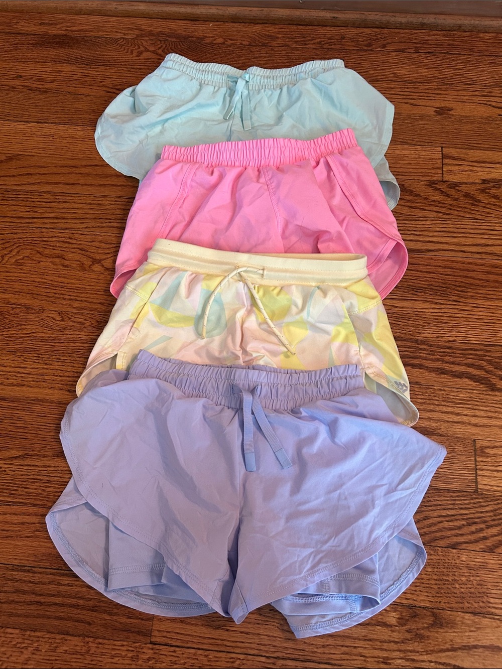 Girl target shorts 4 pack colors: purple, pink, yellow and mint green ALL SZ 6/7